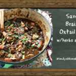 Savory Braised Oxtail Stew with herbs and prunes